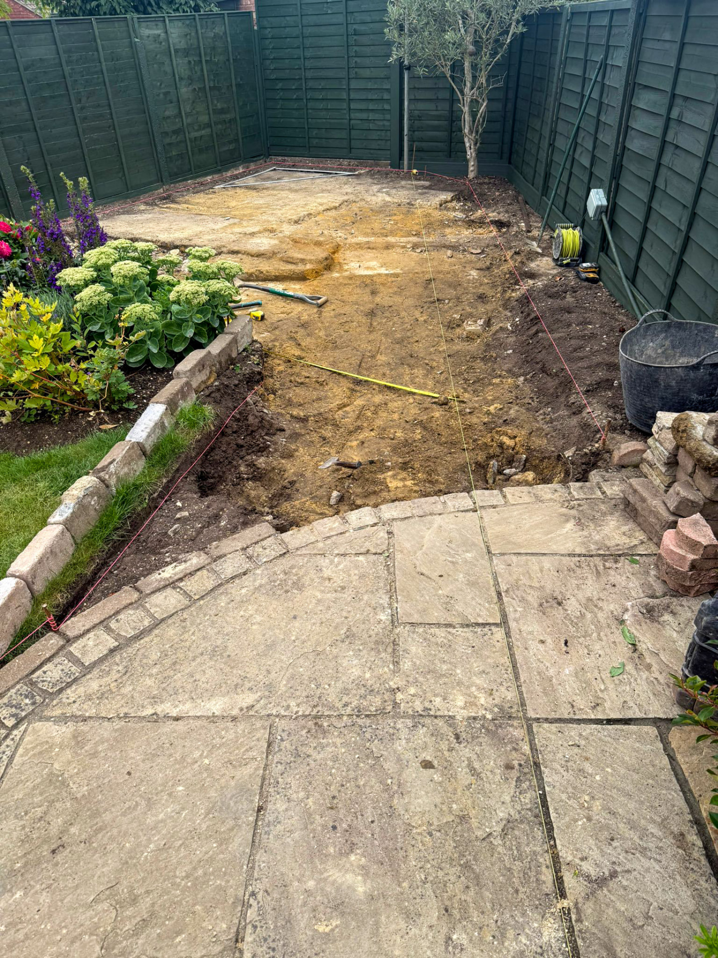 Garden excavated and marked out before new patio was laid